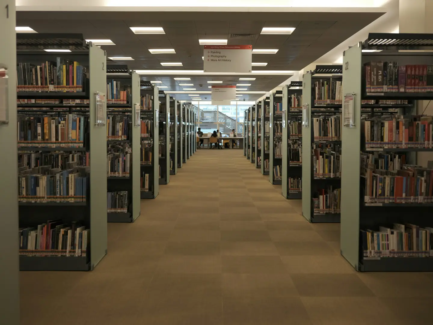brown-wooden-book-shelves-on-brown-floor-tiles