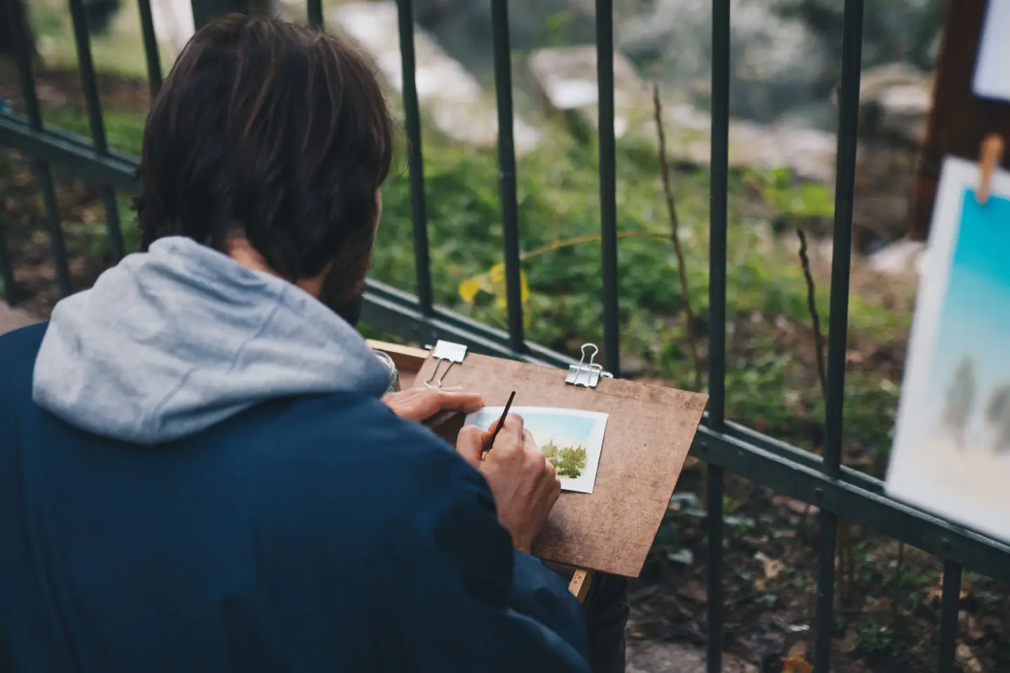 man-painting-outdoor