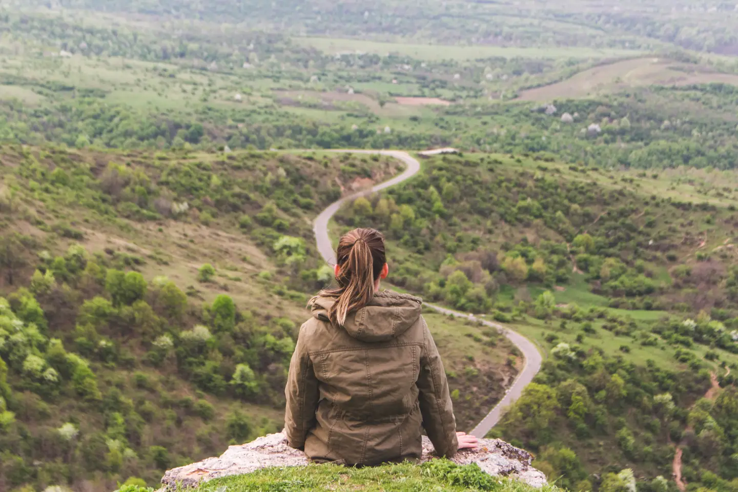 woman-sitting-over-looking-view